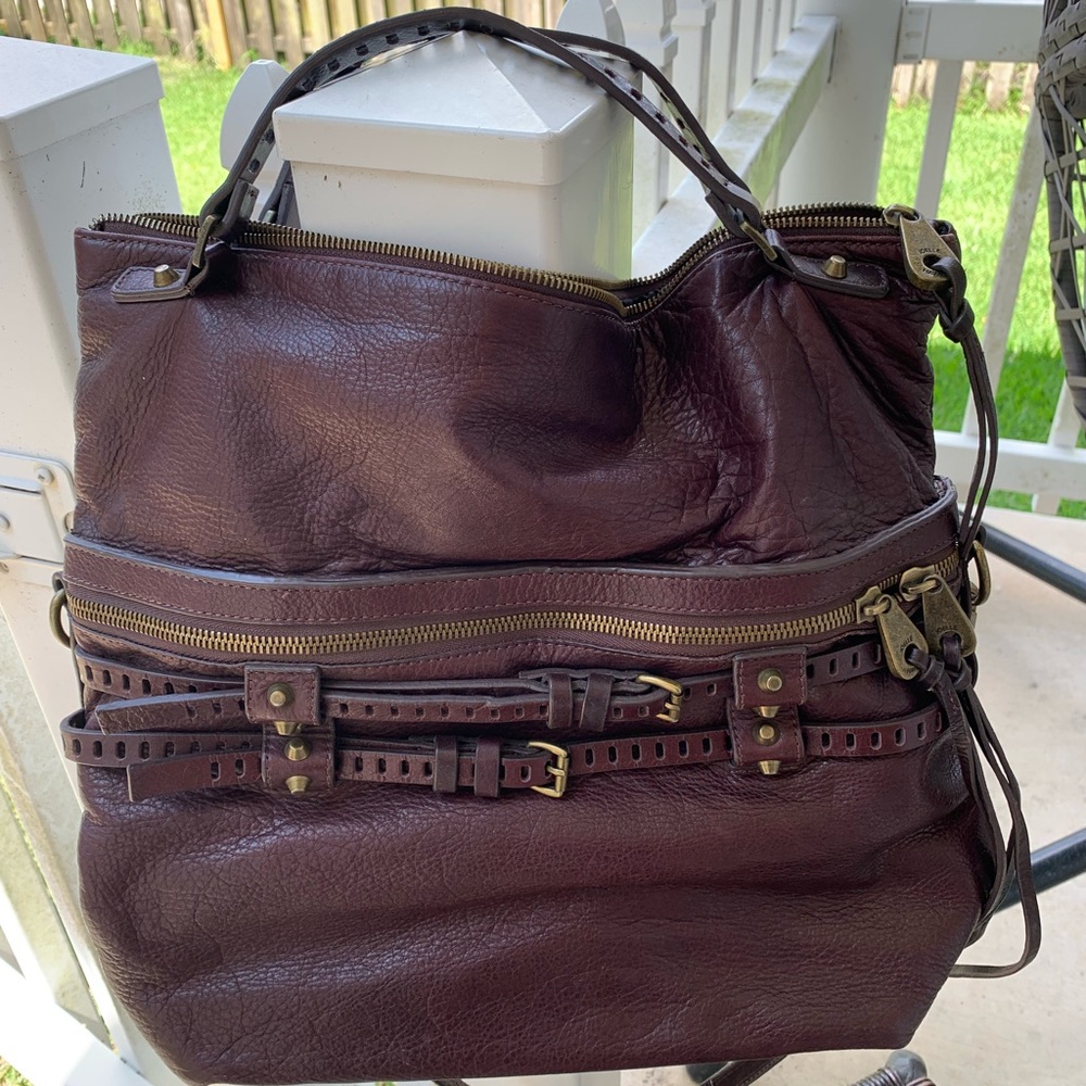 Joelle Hawkens leather bag with buckles